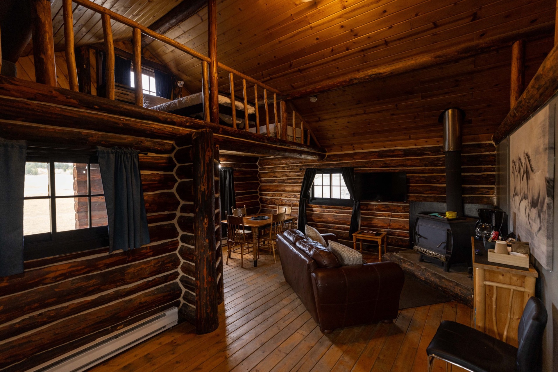 Warm interior of Cabin 3 at Big Bar Guest Ranch